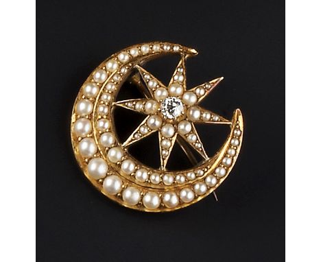 A DIAMOND AND HALF PEARL BROOCH, modelled as a crescent moon enclosing a star, centred with an old-cut diamond framed by grad