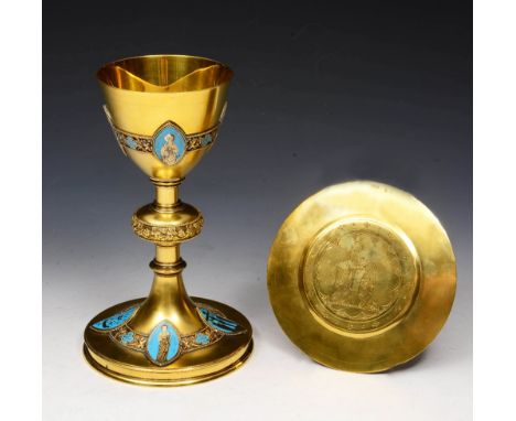 A FRENCH SILVER, GILT AND ENAMEL GOTHIC STYLE CHALICE AND PATEN, the tapering bowl with four enamelled panels depicting Saint