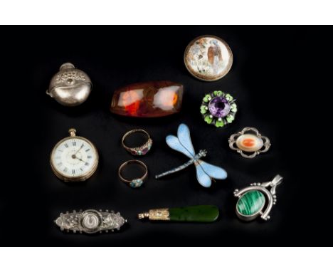 A COLLECTION OF JEWELLERY, to include an enamel and amethyst set panel brooch, a blue enamel dragonfly brooch, a lady's wrist
