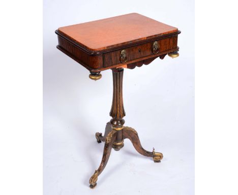 A 19TH CENTURY SATINWOOD AND ROSEWOOD OCCASIONAL TABLE with single frieze drawer, on simulated rosewood lobed column and trip