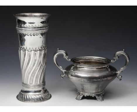 A VICTORIAN SILVER TWO HANDLED BASIN with scrolling handles and four shell decorated feet, 20cm wide, London 1839 by Richard 