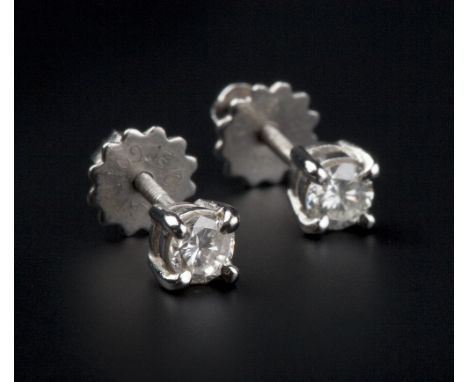 A PAIR OF DIAMOND EARSTUDS, each round brilliant-cut diamond in four claw setting, on threaded post and butterfly fittings, w