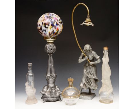 AN ART DECO STYLE METAL LAMP in the form of a girl with ball, with coloured glass shade, 57cm high, another metal lamp, opaqu