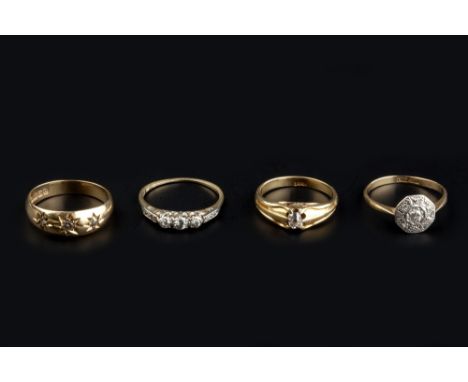 FOUR DIAMOND SET RINGS, comprising an old-cut diamond single stone gyspy ring, stamped '18ct', a three stone gypsy ring, moun