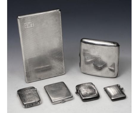 A SILVER SLIDE ACTION CIGARETTE CASE with engine turned decoration, 24.5cm long, Chester 1937 by Jay & Richard Attenborough; 