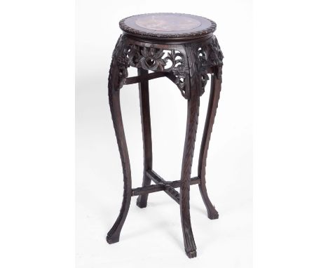 A CHINESE HARDWOOD URN STAND with inset marble top, carved decoration and splay legs, 76cm high