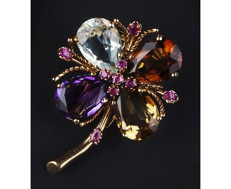 A VARI GEM-SET FLOWER BROOCH, of stylised design, with pear-shaped mixed-cut amethyst, citrine and rock crystal petals, frame