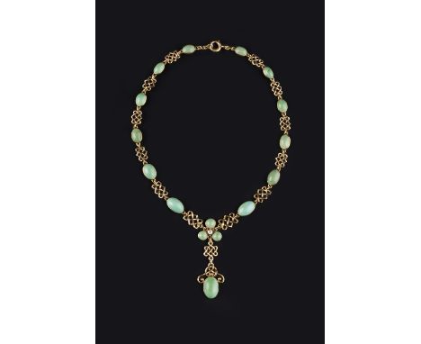 A TURQUOISE AND DIAMOND SET PENDANT NECKLACE, comprising a line of graduated oval turquoise cabochons, most with reverse carv