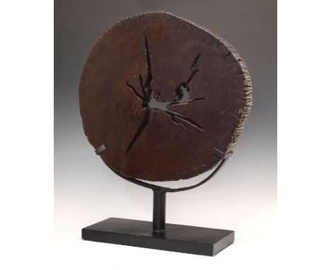 Modern Design - Circular sculpture formed from a slice of tree trunk, on a black finish stand, overall height 75cm   Conditio