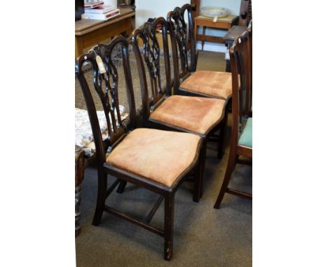 Three late 19th Century carved mahogany Chippendale style side chairs, each having a pierced back splat, drop-in seat and sta