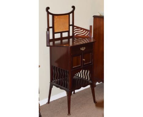 Edwardian mahogany side cabinet having a raised back, one drawer to the frieze, cupboard doors and open shelf below and stand