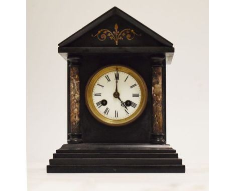 Late 19th/early 20th Century black slate cased architectural style mantel clock, the white enamel dial with Roman numerals, b