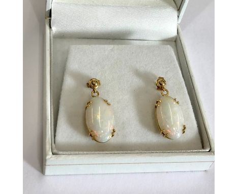 Fine 18ct gold and opal earrings each set with large 6.84ct opal in hallmarked 750 gold mounts and marked  6.84