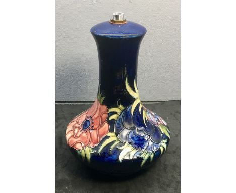 Moorcroft pottery lamp base with floral design measures approx 19cm tall in good condition 