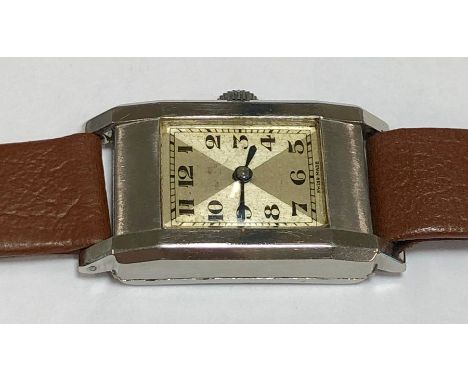 Vintage stainless steel Rolex watch co Marconi watch winds and ticks but no warranty given case measures appox 36mm by 21mm n