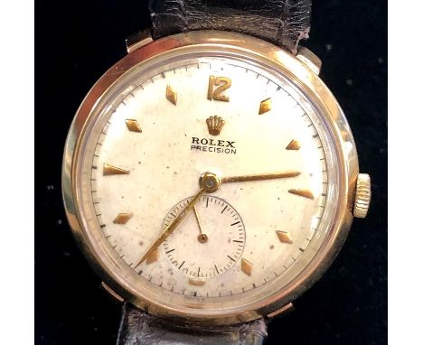 Vintage 9ct gold Rolex precision  wristwatch winds and ticks case measures 34mm  dia not including  lugs or winder full 9ct g