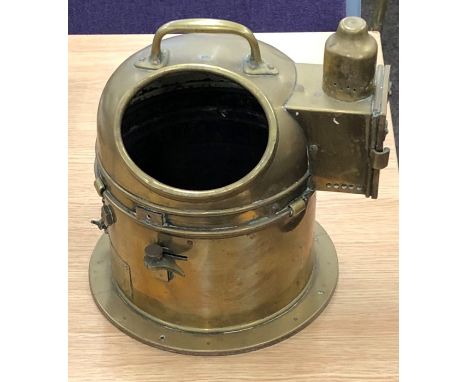 An early 20th century ships brass binnacle gimbal wet compass, case only, in brass binnacle housing, the side fitted with a s