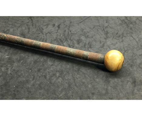 Rare antique tribal rhino horn zulu knobkerrie club with unusual wirework and with a spherical rhino horn finial that measure