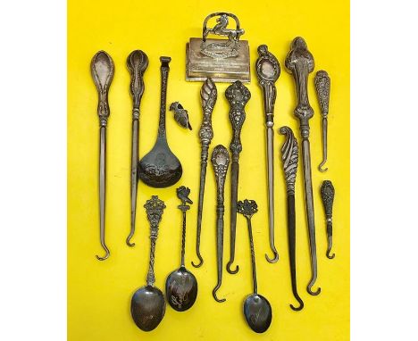Selection of silver items includes button hooks spoons the officers 7th bnt the kings regt menu holder etc