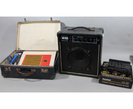 An X-12 Realistic combo amplifier, with front grille speaker and upper handle, 44cm high, 34cm wide, 21cm deep, a Camlink sou