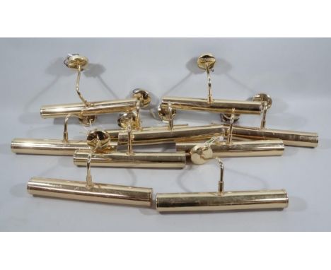 Various modern metal lights, portrait lights, brass finish, etc., 32cm wide. (a quantity)