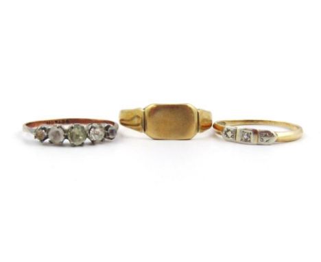 A ladies dress ring, set with three stones, marked 14kt, 1g all in, size K-L, a 9ct gold signet ring, 1.8g, and a paste dress