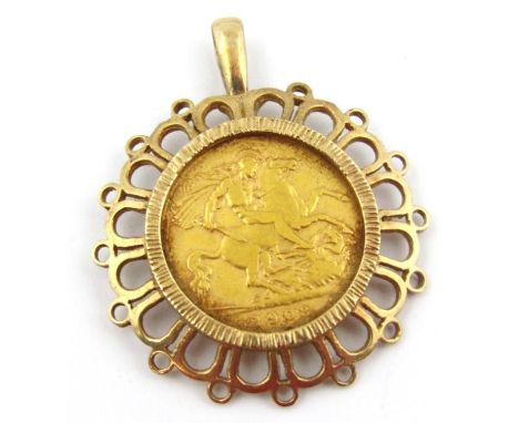 An Edwardian half sovereign 1908, in sun burst mount with fixed elongated ring top, marked 9ct, 4cm high.