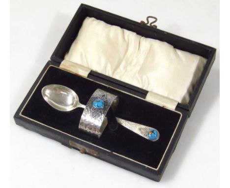 A George V silver christening set, by Langstone Silver Works Barnard Nistone, comprising of an oval napkin ring and teaspoon 