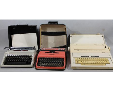 Three various retro typewriters, to include a Lettera 22, in peach colourway 27cm wide and outer case, a Brother AX015 word p