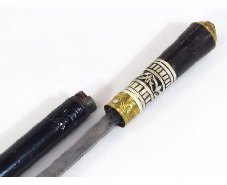 A very early 20thC tribal style sword stick, with gilt metal top, carved bone and gilt metal collar and plain metal end, part