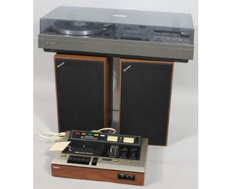 A Sharp RT-3500H part cassette stereo deck, 47cm wide, Sharp SG-400E music centre and CP400 E speaker system. (boxed)