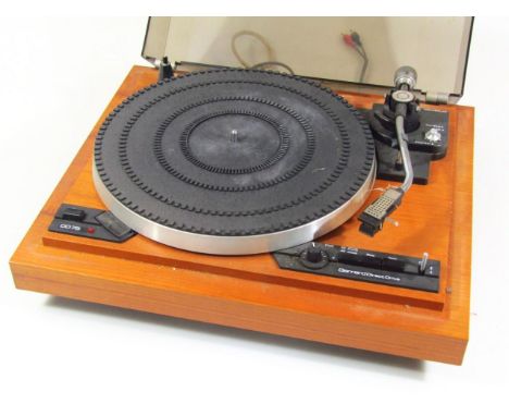 A mid 20thC Garrard Direct Drive DD75 turn table, with Perspex case and teak style base, 17cm high, 45cm wide, 37cm deep.
