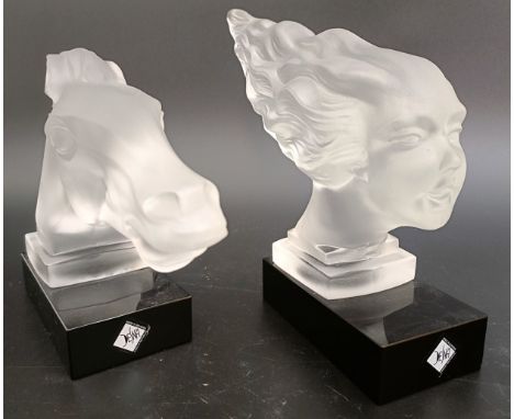 A Lalique style frosted glass mascot, in the form of bust of a woman, on a black glass base, 24 cm wide, another, in the form