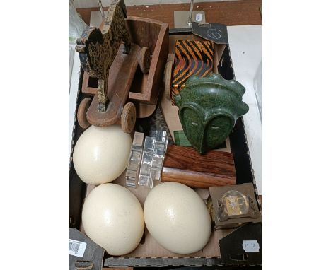 Three ostrich eggs, on perspex stands, a brass and glass carriage clock and assorted other items (box)