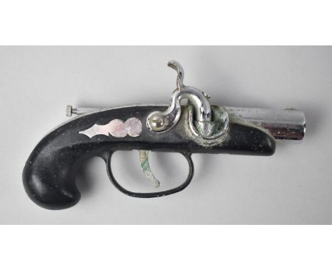 A Mid 20th Century Chrome and Wood Cigarette Lighter in the Form of a Percussion Cap Pistol, 14cms Long 