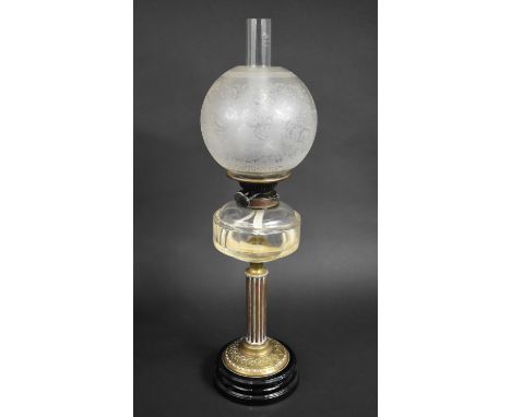 A Late Victorian Oil Lamp with Ribbed Brass Column Support, Plain Glass Reservoir, Etched Globe Shade and Plain Chimney, 70cm