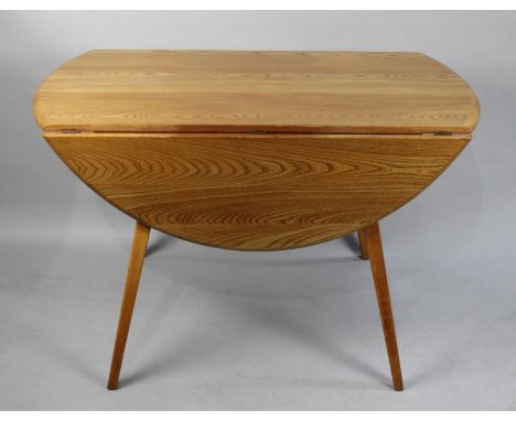 A Vintage Ercol Drop Leaf Dining Table 