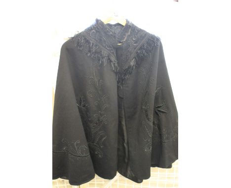 Vintage ladies black cape with foliate floral detail.