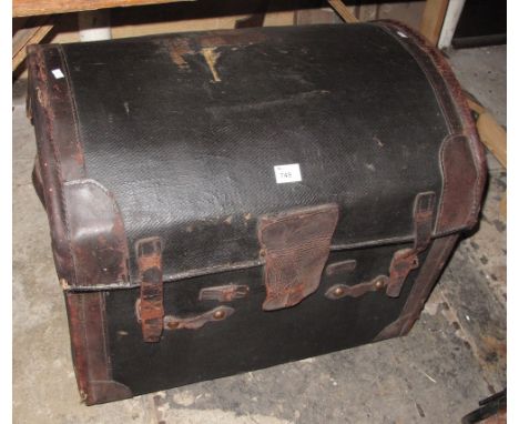 Vintage dome topped, canvas trunk.
