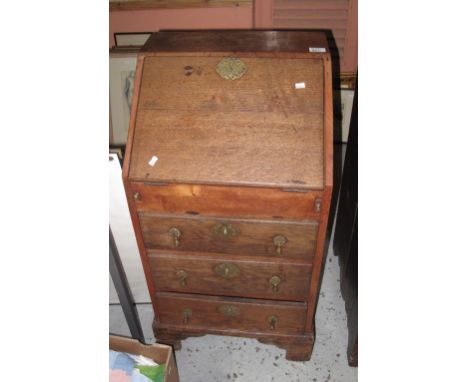 Small narrow oak fall front bureau with three drawers on bracket feet.  CONDITION REPORT: Width - 18.5" approx.
Depth - 16.5"