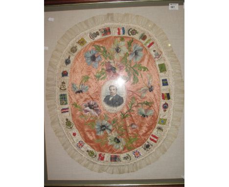 A First World War period embroidered and appliquéd panel with portrait of E. Redmond, M.P.  Framed and glazed.