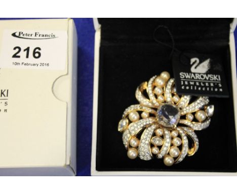 Ladies Swarovski crystal pearl and stone set ladies brooch in original box.