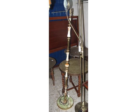 Gilt and onyx standard lamp on pedestal base together with another modern gilt finish standard lamp.  (2)