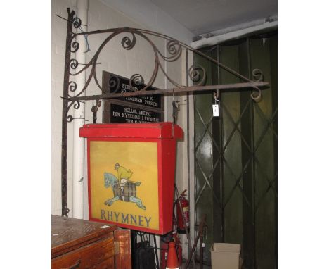Vintage metal and enamelled Rhymney double sided hanging pub sign together with wrought iron wall bracket. 