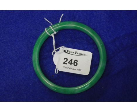 Green hardstone bangle. CONDITION REPORT: Minor wear but no obvious damage. 