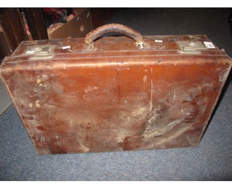 Vintage tan leather suitcase bearing initials W.R.R.