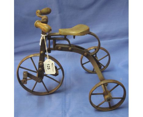 Well made metal model of a bone shaker tricycle.