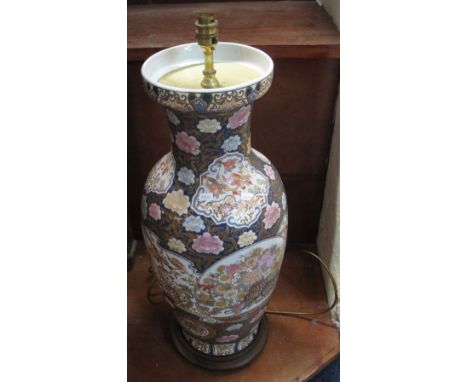 Pair of large Japanese style porcelain baluster shaped lamp base floor vases with wooden platforms. (2)
