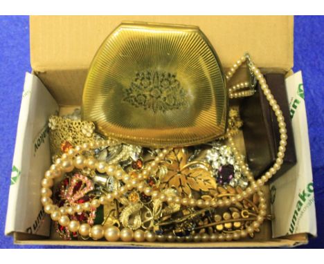 Small box of assorted costume dress jewellery to include: ladies compact; pearls; brooches etc.