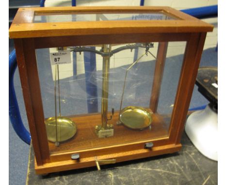 Cased chemical spring balance scales.